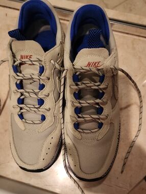Nike Women’s Cream Sneakers with Blue Lining and Accents